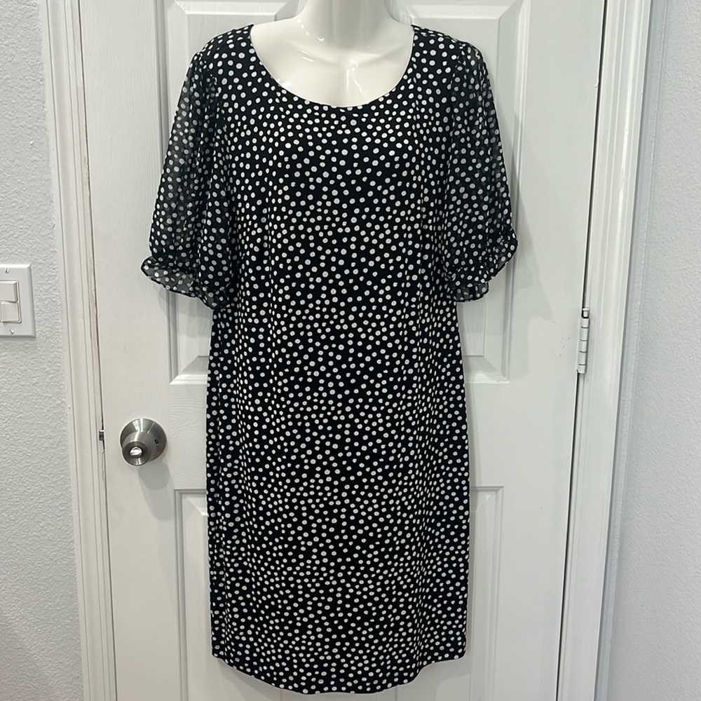 Black dress with white dots.